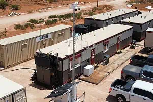 Mobile surveillance trailer with solar security camera protects portable buildings and trucks.